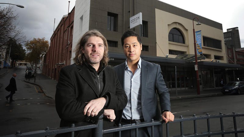 Leigh Carmichael and David Lee standing in front of the Odeon Theatre
